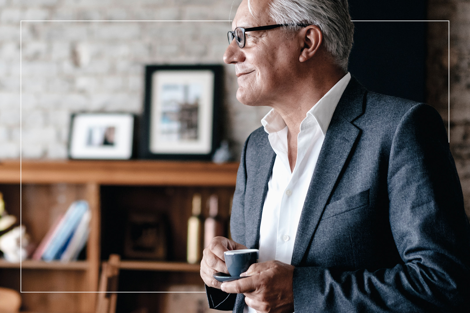 older man with espresso cup