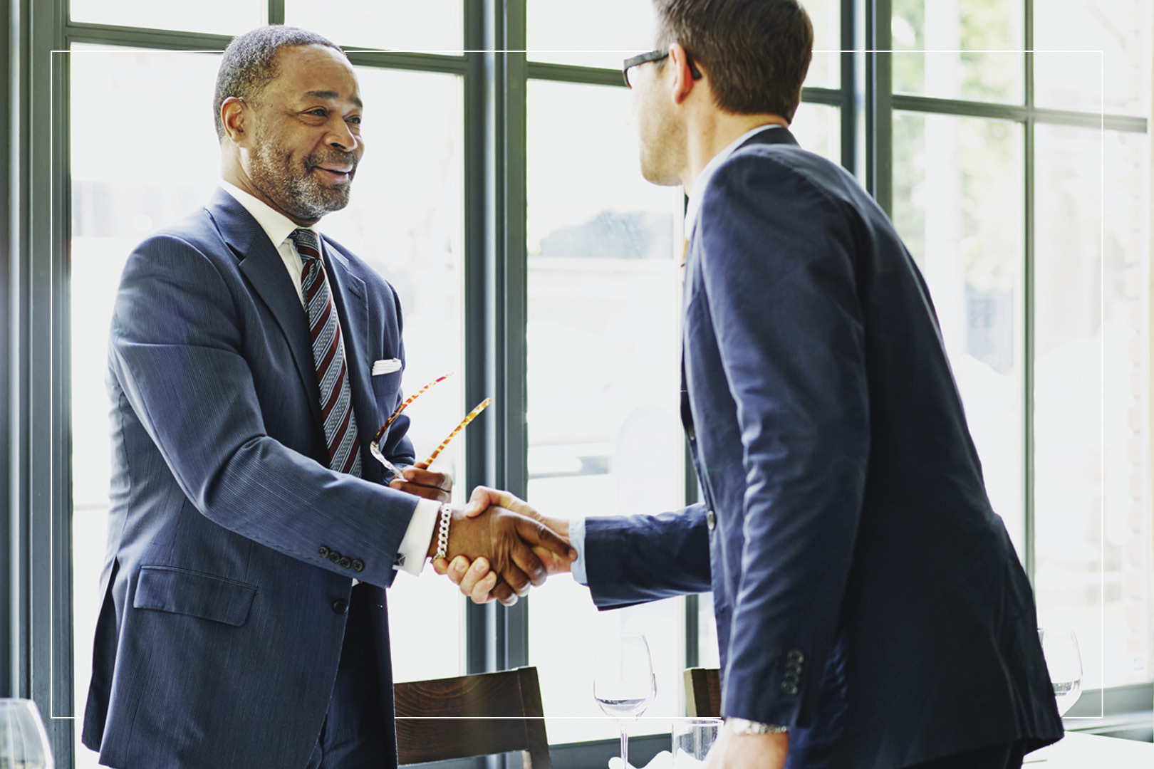 Two businessmen shaking hands